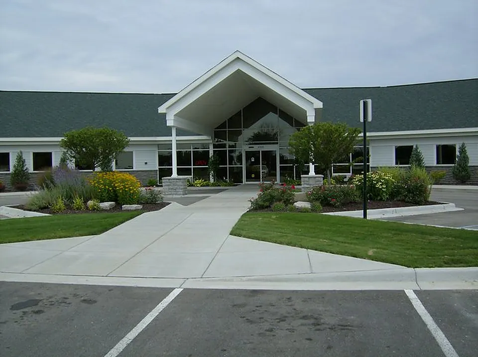 The Isabella Urgent Care building on East Bluegrass Road, with the parking lot at the entrance.